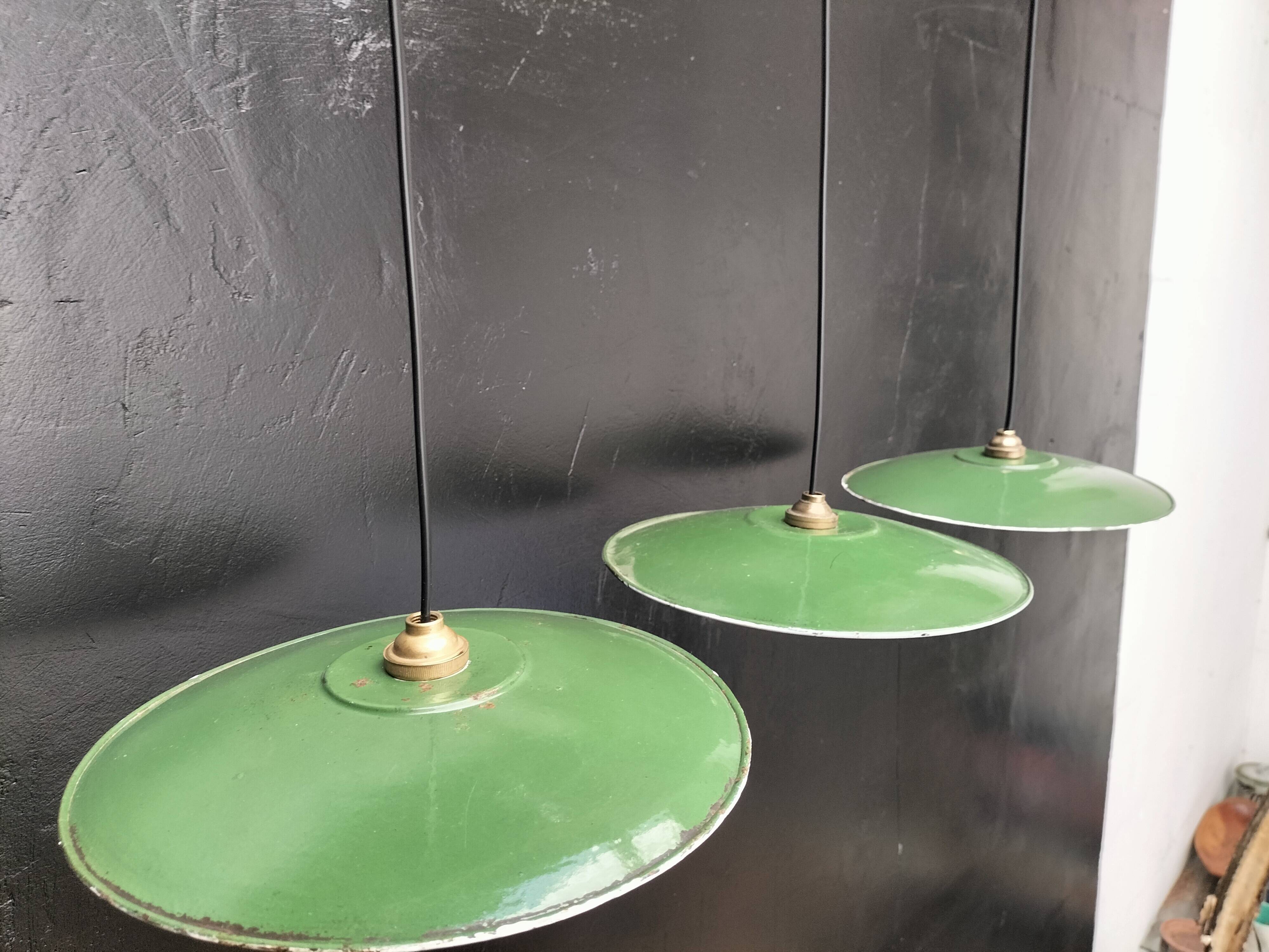 Three enamelled sheet metal suspensions