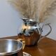 Antique stainless steel milk jug by Remy Letang
