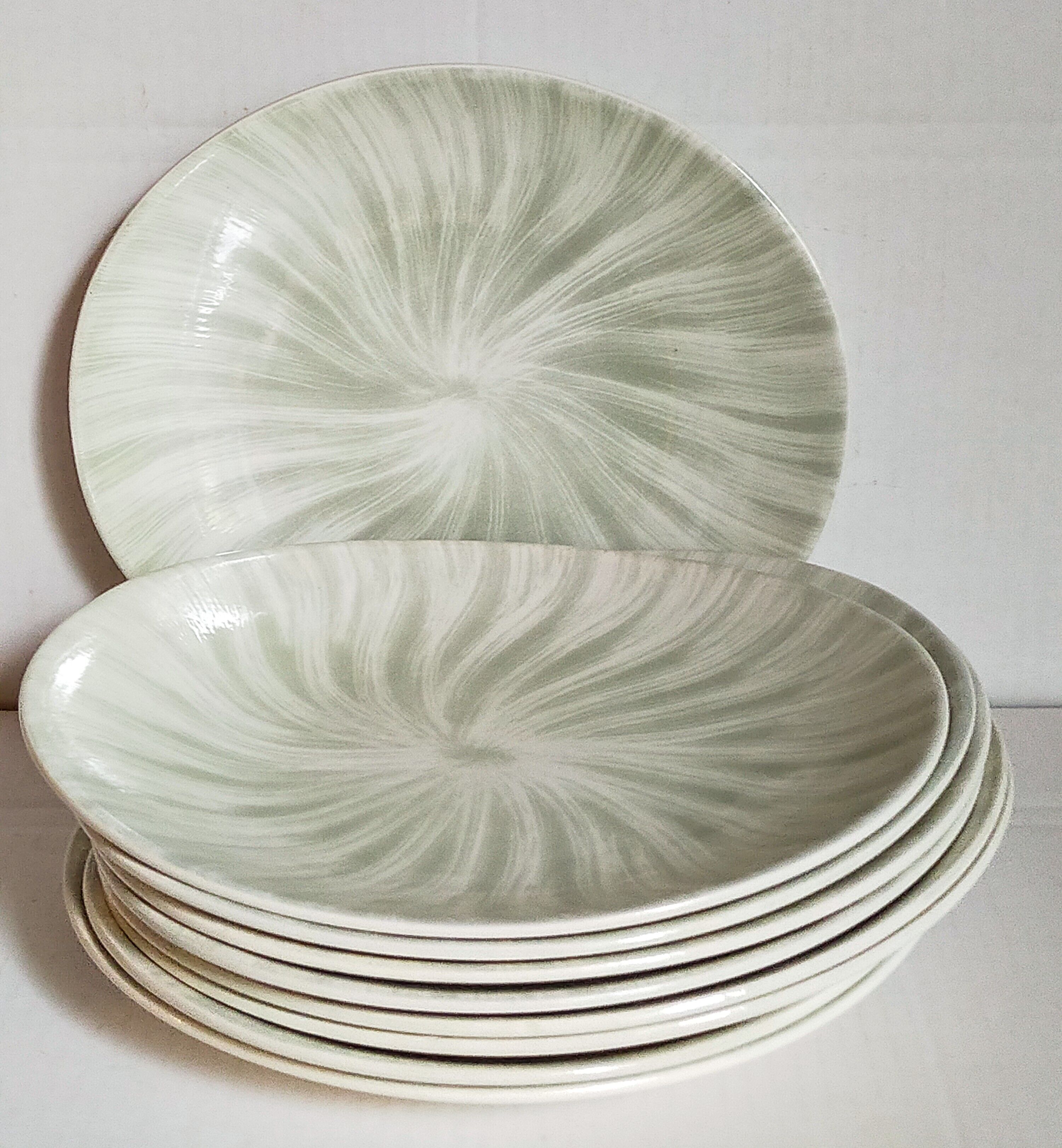 Nine earthenware plates from Salins-les-Bains vintage