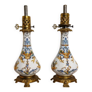Gien: pair of antique oil lamps in fine earthenware richly decorated.