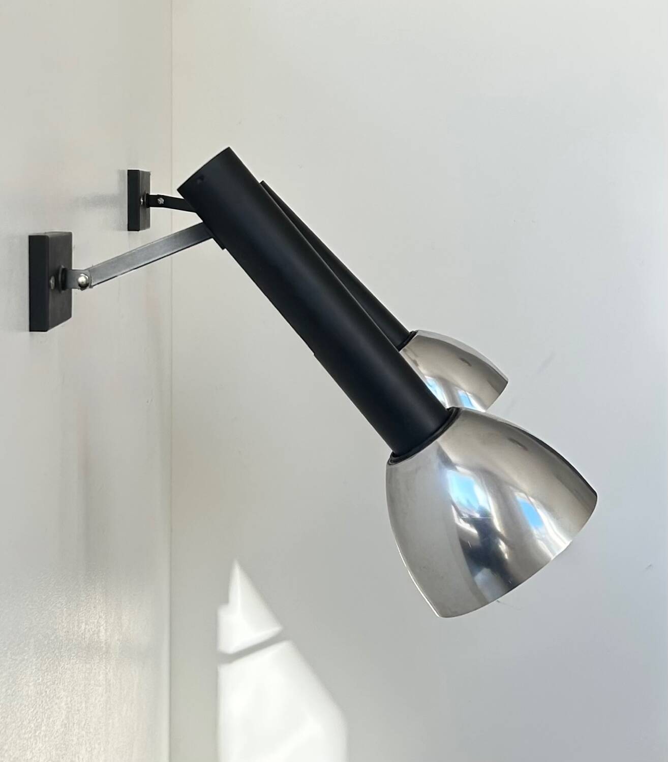 Pair of vintage wall lights, chrome and matte black metal, France 1960