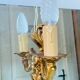 Louis XV bronze wall light with a flowing branch design and acanthus leaf decoration.