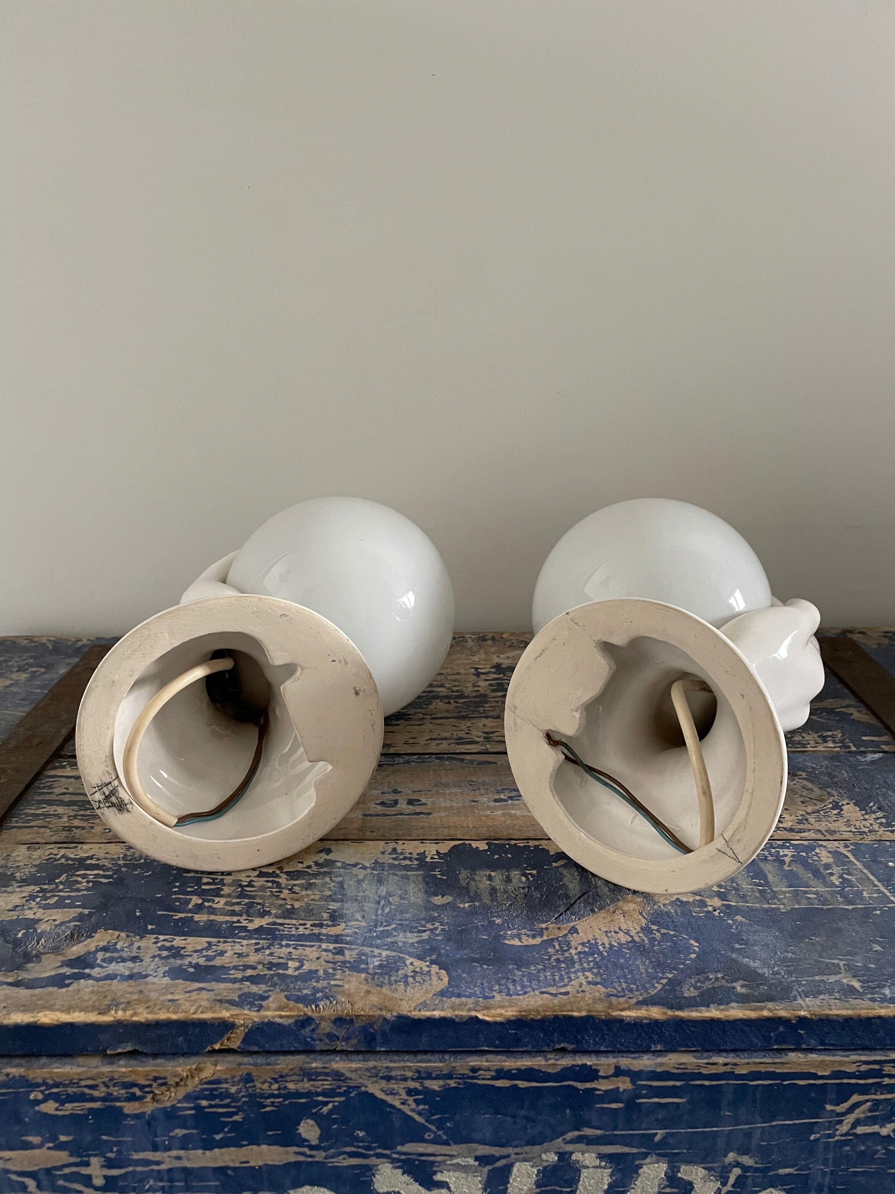 Set of two white ceramic hand sconces