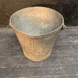 Ancient metal garden bucket