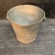 Ancient metal garden bucket