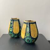 A pair of green and yellow vases