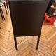 Many brown leather chairs "Roche Bobois"