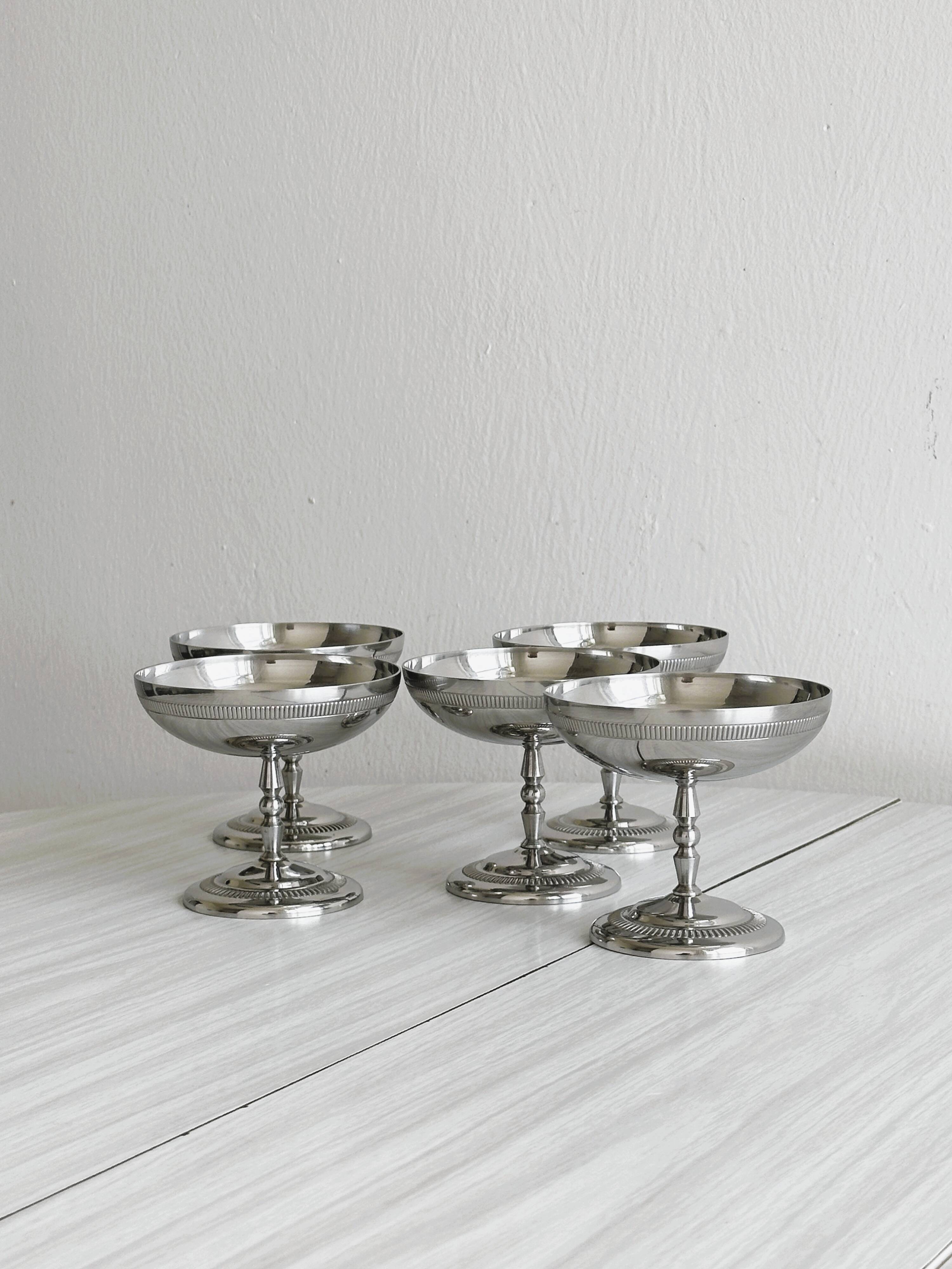 5 silver-plated metal cups
