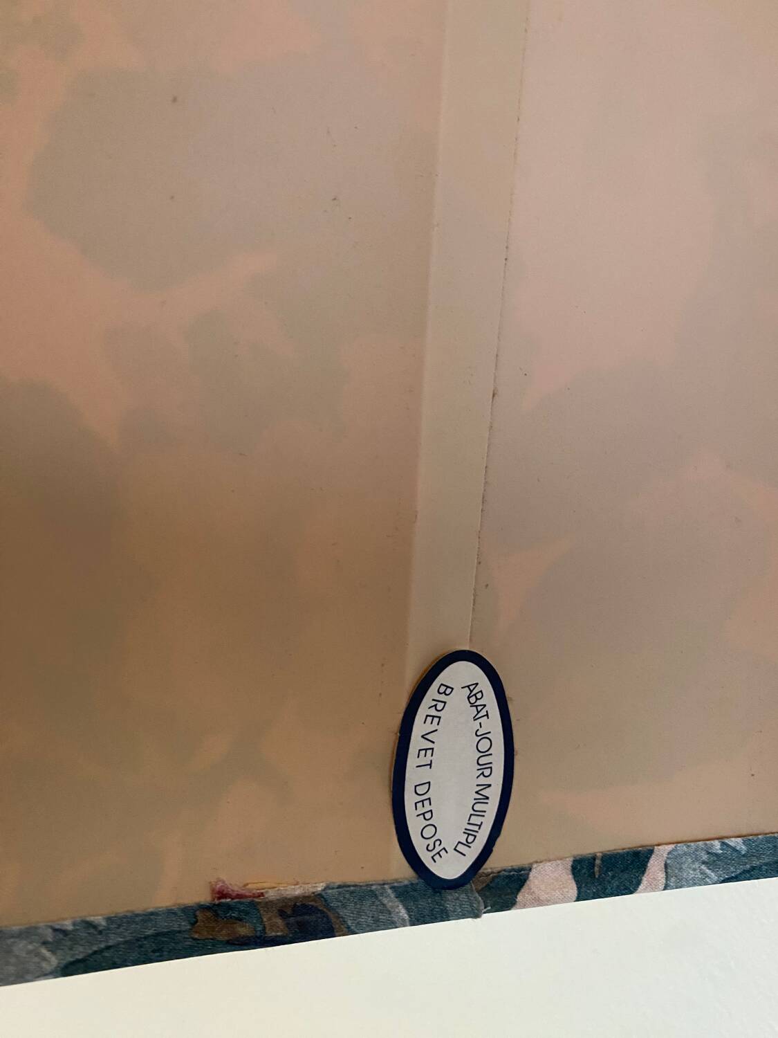 Large blue ceramic lamp with floral shade