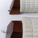 Opaline and teak sconces