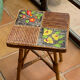 Rattan and ceramic coffee table attributed to Audoux and Minnet.