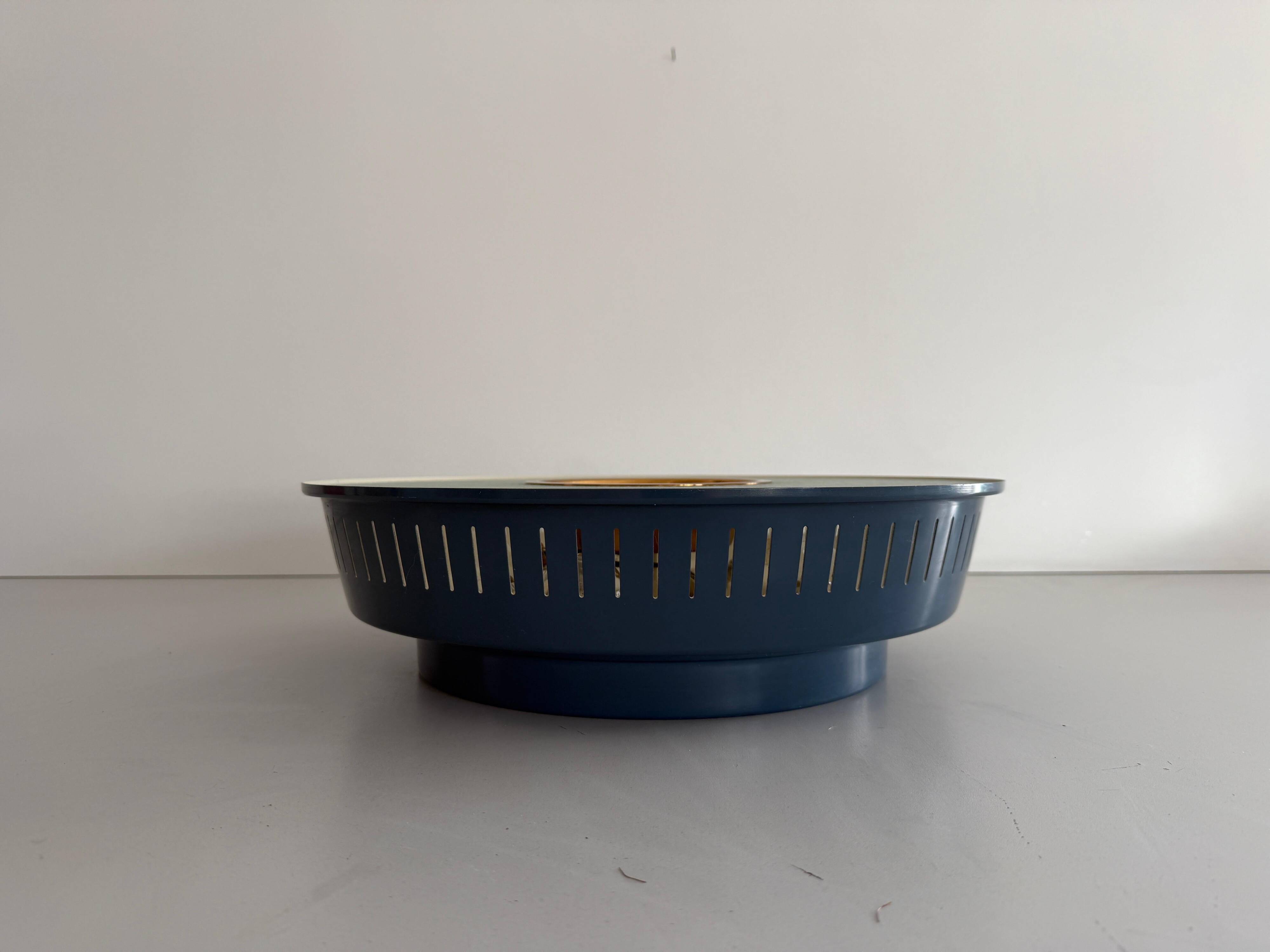Flush-mounted metal frame with dark blue glass, Attributed to Stilnovo, 1950s, Italy.