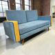 Vintage blue armchair/daybed/sofa bed with yellow accents.