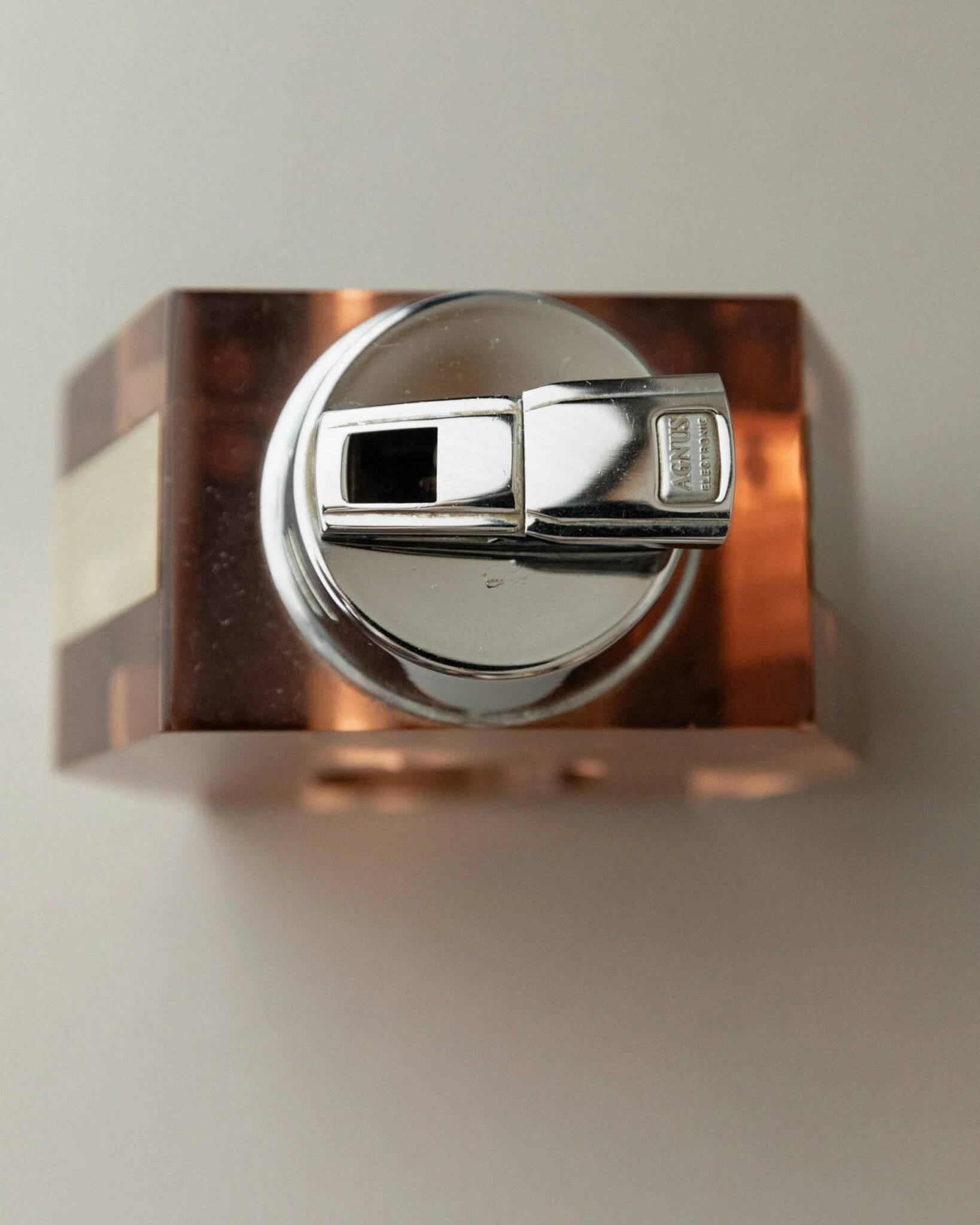 Apricot plexiglass table lighter by Astrolite with silver frame - Space Age Italian 1970s sculpture