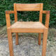Brutalist chair in solid pine with a straw seat from the 1970s.