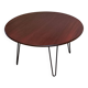 Round coffee table with mahogany wood top