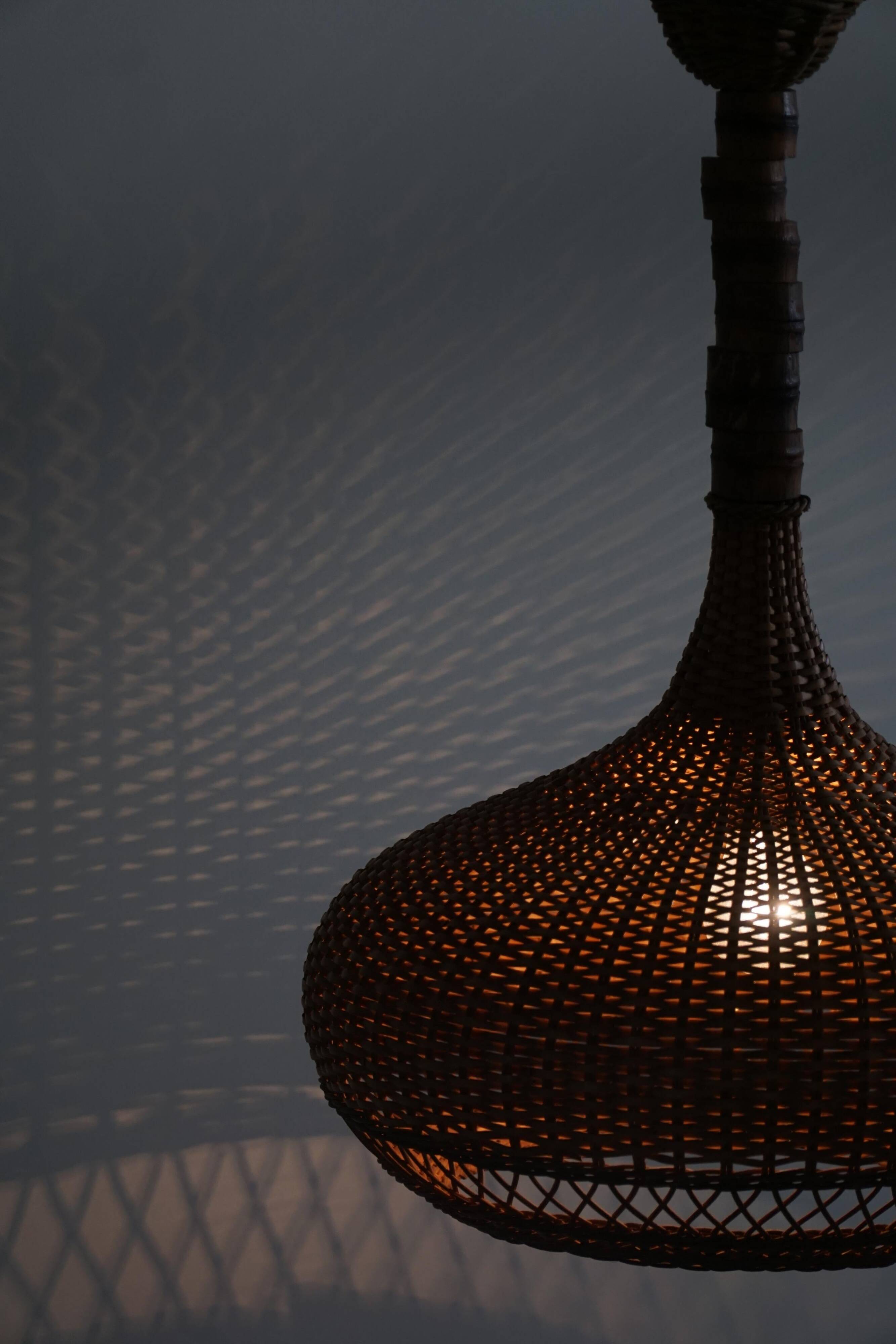 Vintage Danish mid-century rattan pendant light, made in the 1960s.