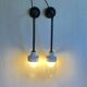 Pair of Art Deco wall lights in cast iron, glass and ceramic from the 1930s.