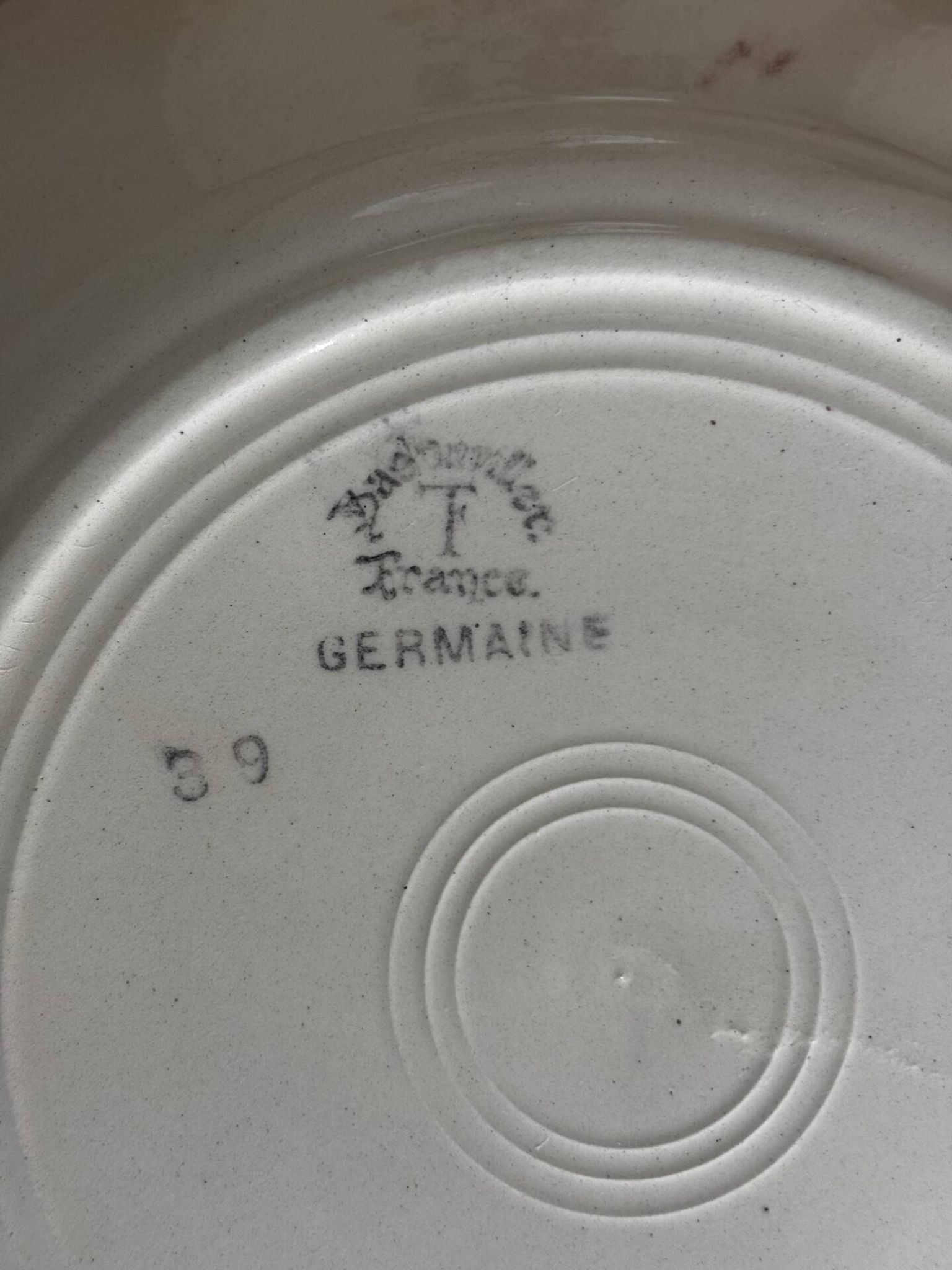 Set of 7 flat plates Badonviller Germaine