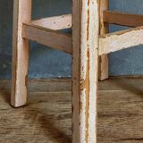 Antique workshop stool in patinated solid wood
