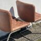 Paire de chaises en cuir par Robert Haussman