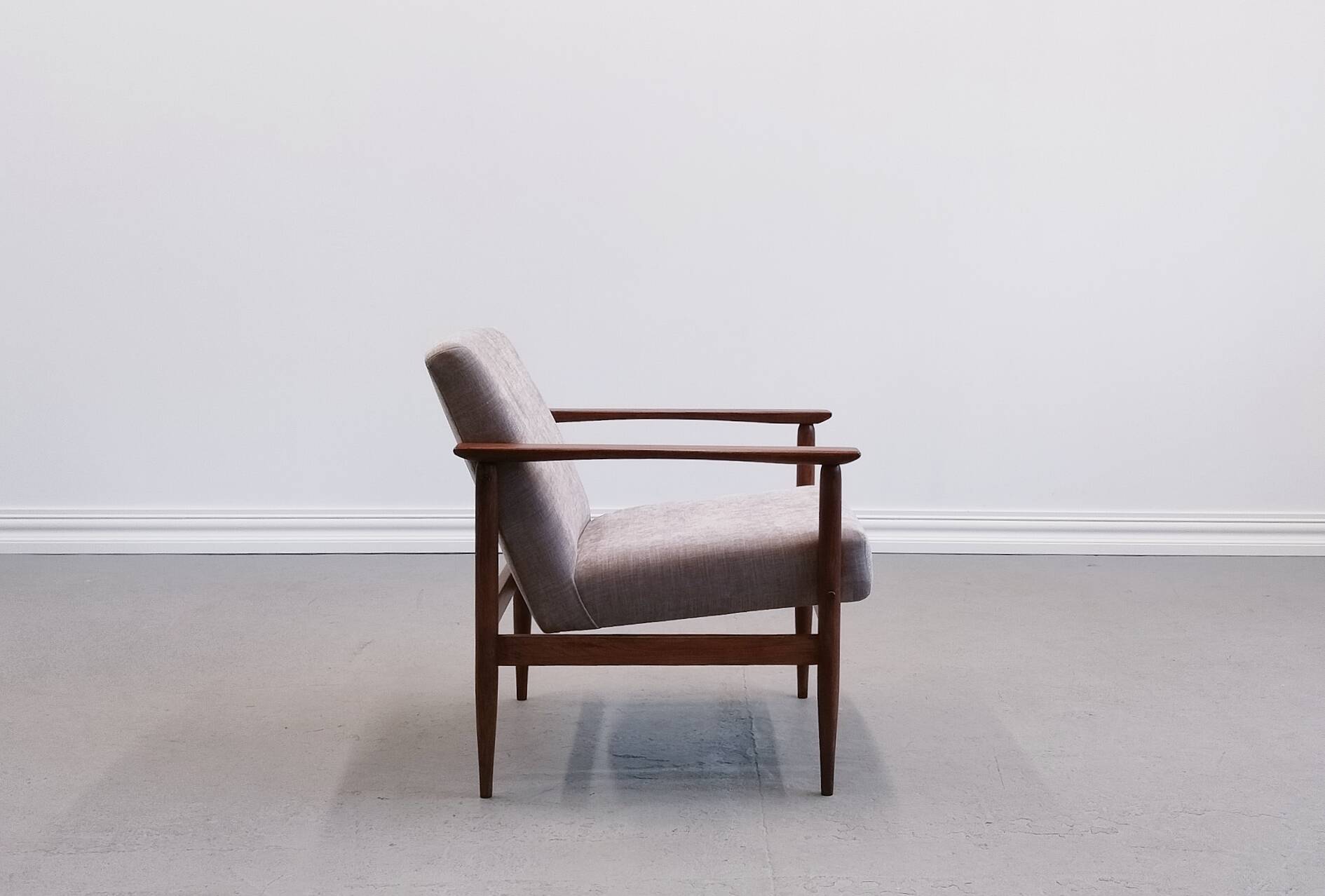 Mid Century Easy Chair in warm gray textile.