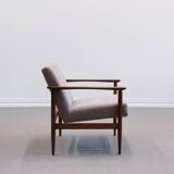 Mid Century Easy Chair in warm grey textil.