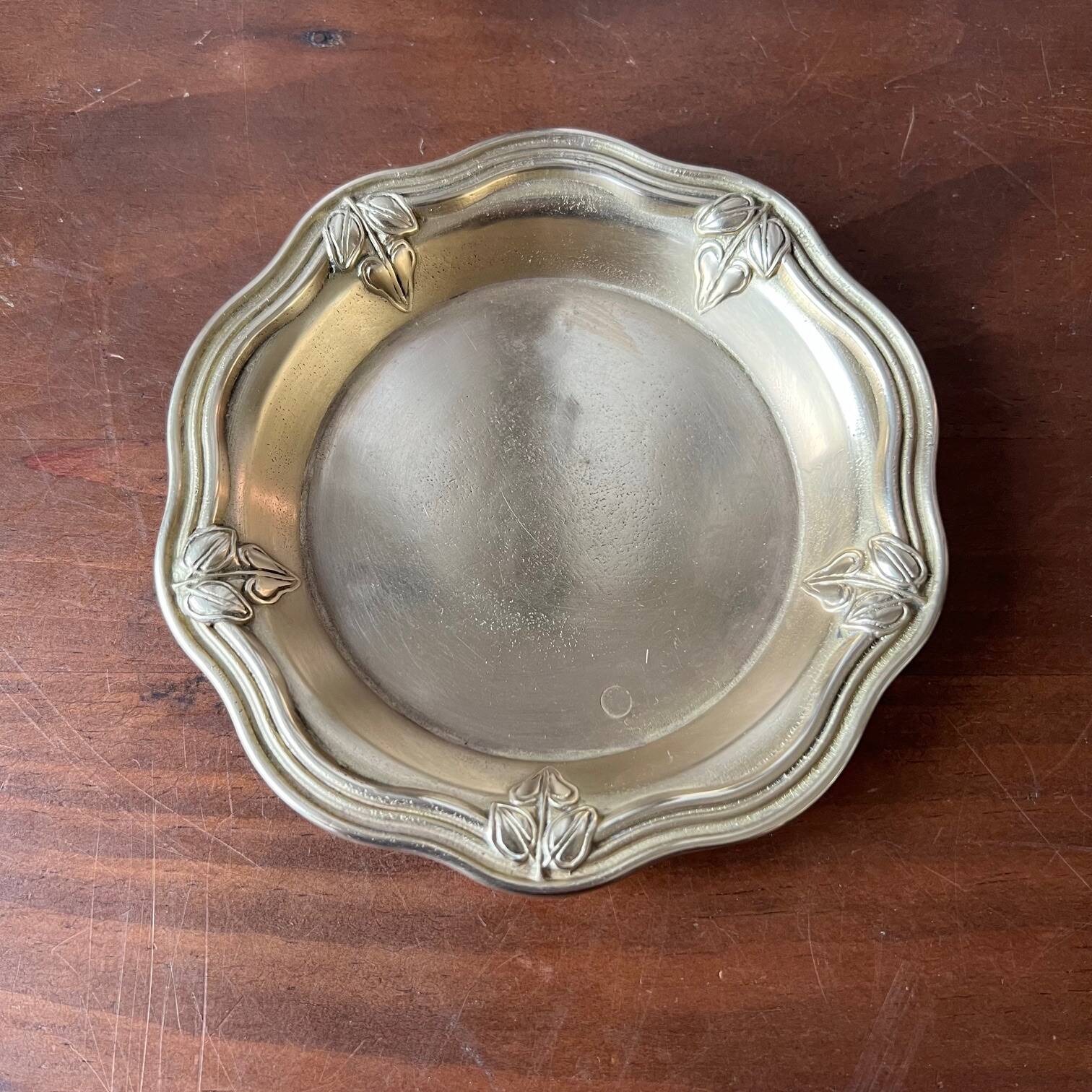 Bronze cup, chiseled