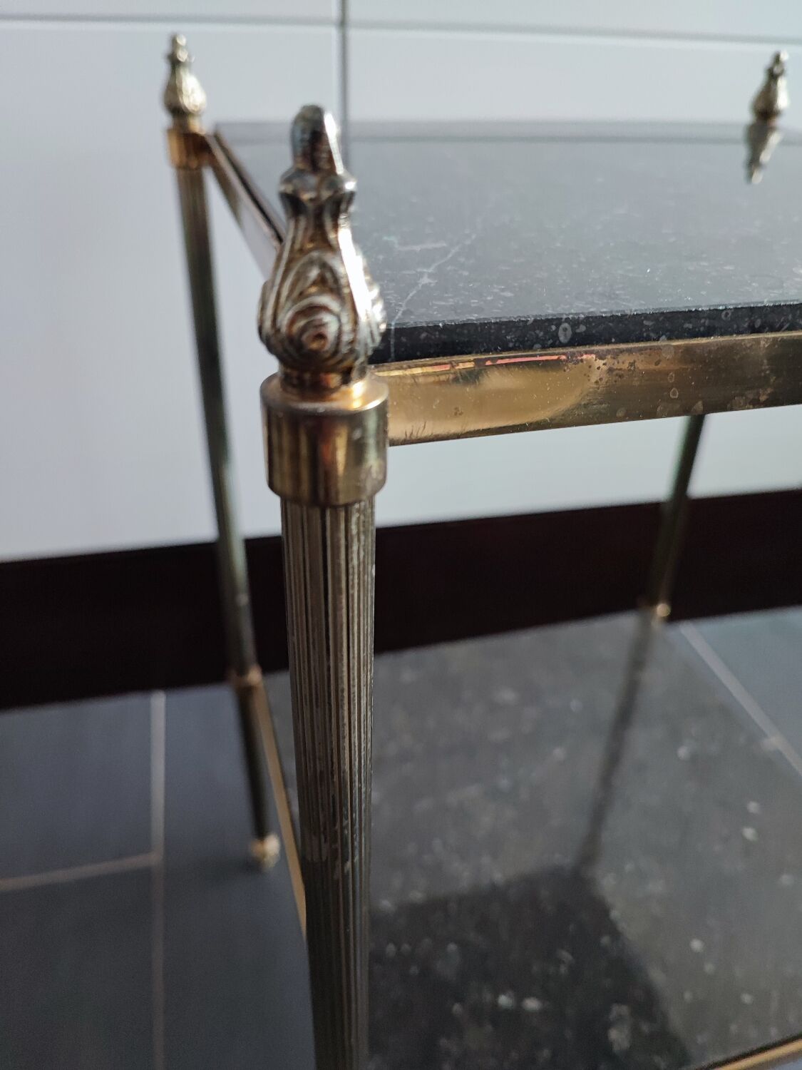 Black marble and brass stool