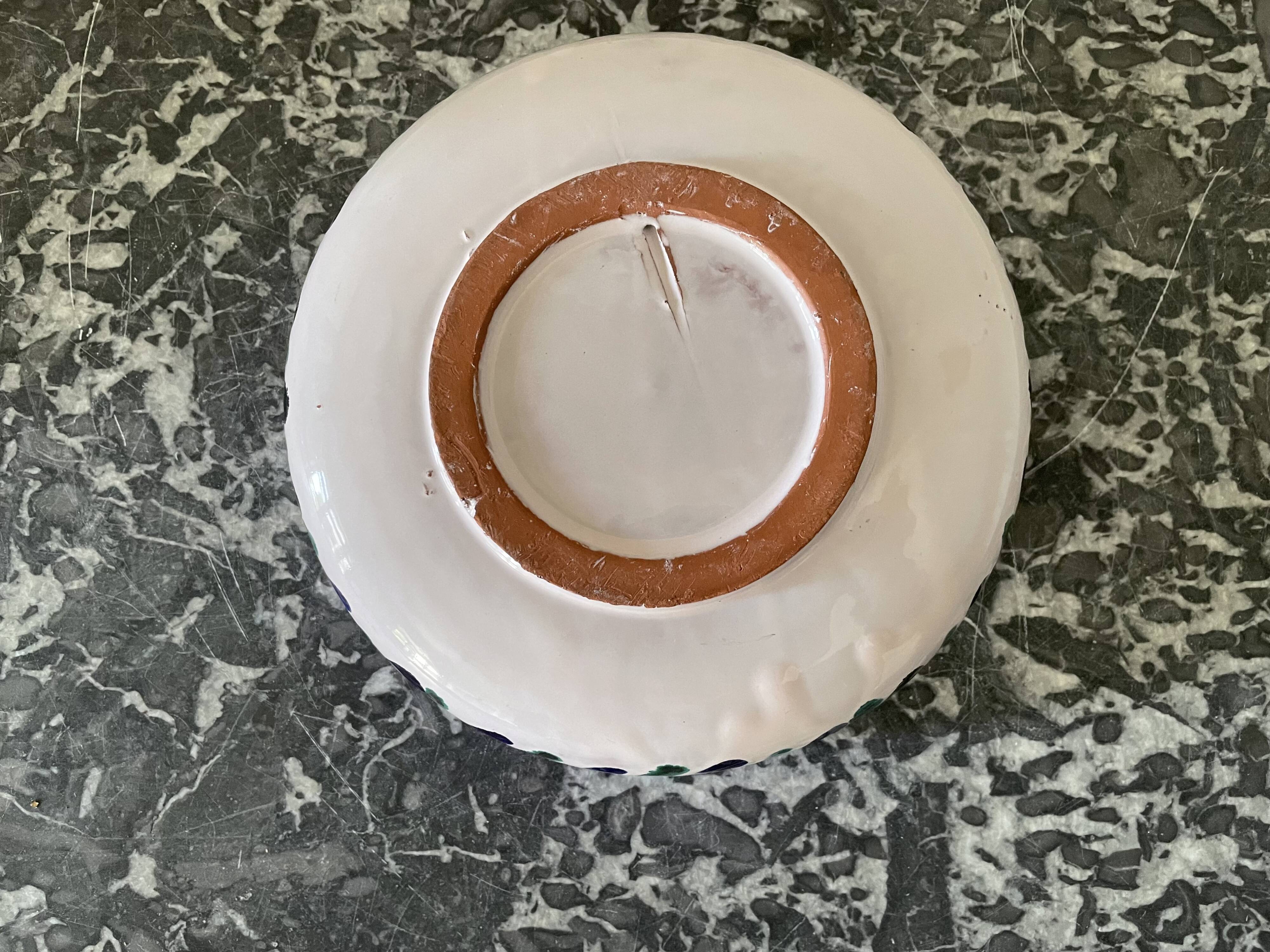 Hollow plate in ceramic from Granada.