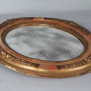 Antique oval mirror with original stucco and gilt wood frame, 37x31 cm. Beautiful patina.