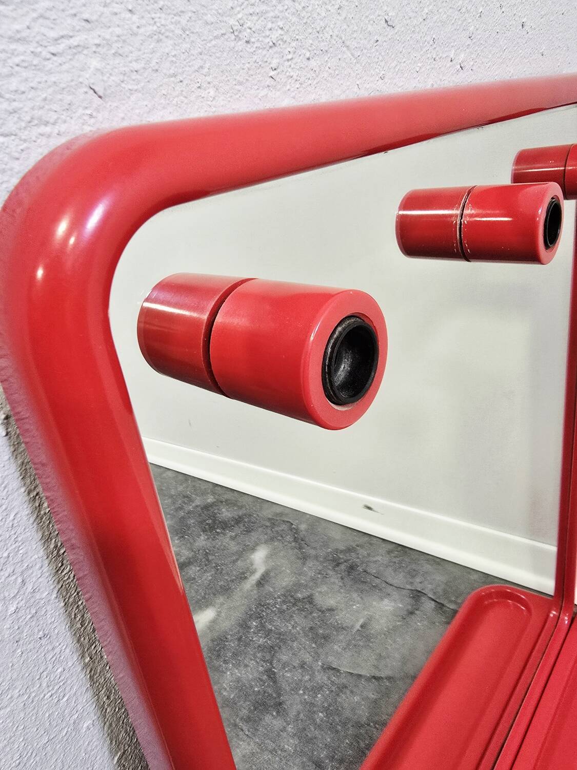Mirror with a red shelf from the 90s.
