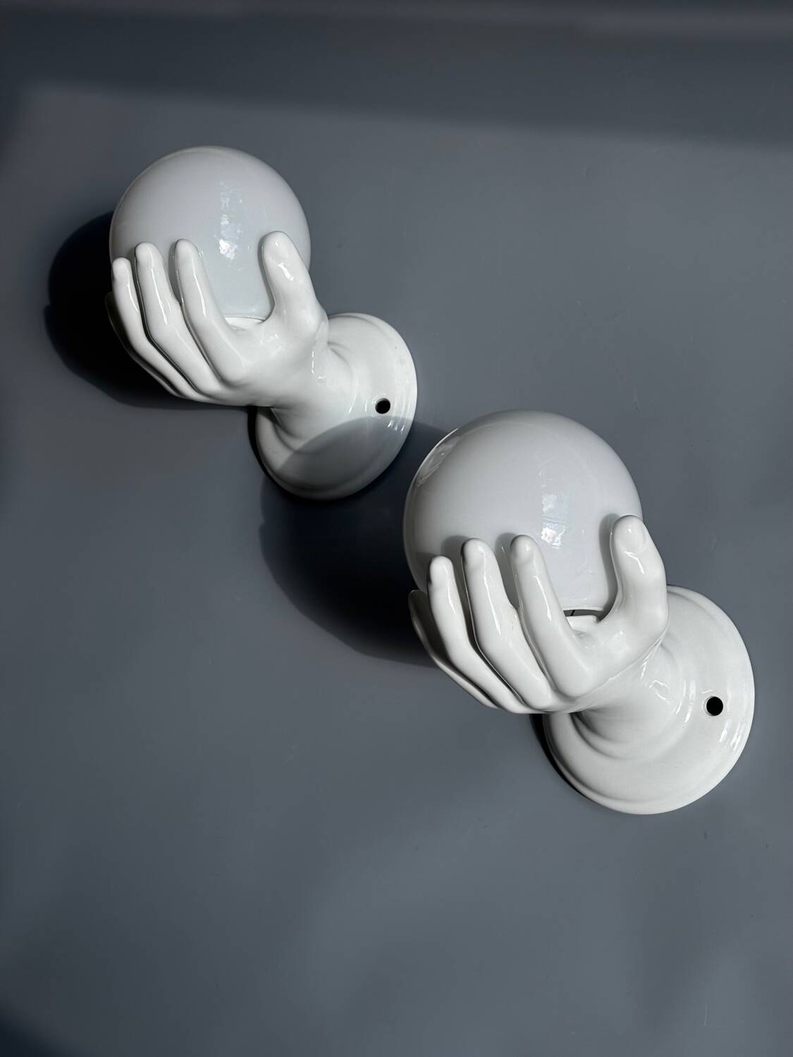 Pair of opaline and ceramic hand sconces