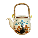 Vintage teapot in stoneware and wicker