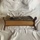 Porte-revue vintage en bois sculpté