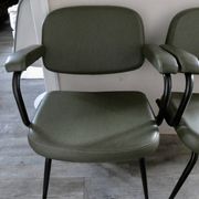 Pair of khaki green metal and skai armchairs from the 1960s