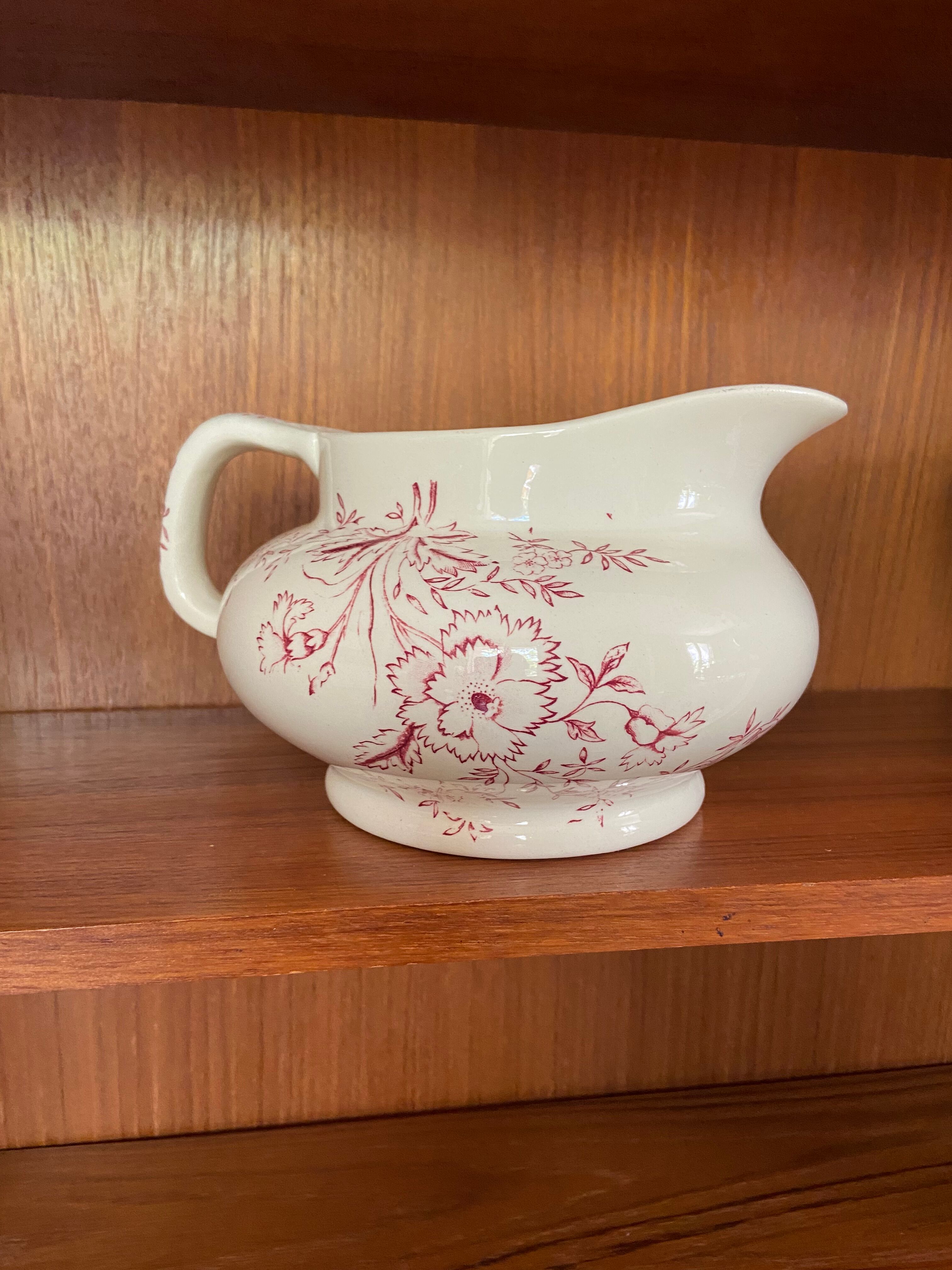 Vintage earthenware pitcher Iron earth