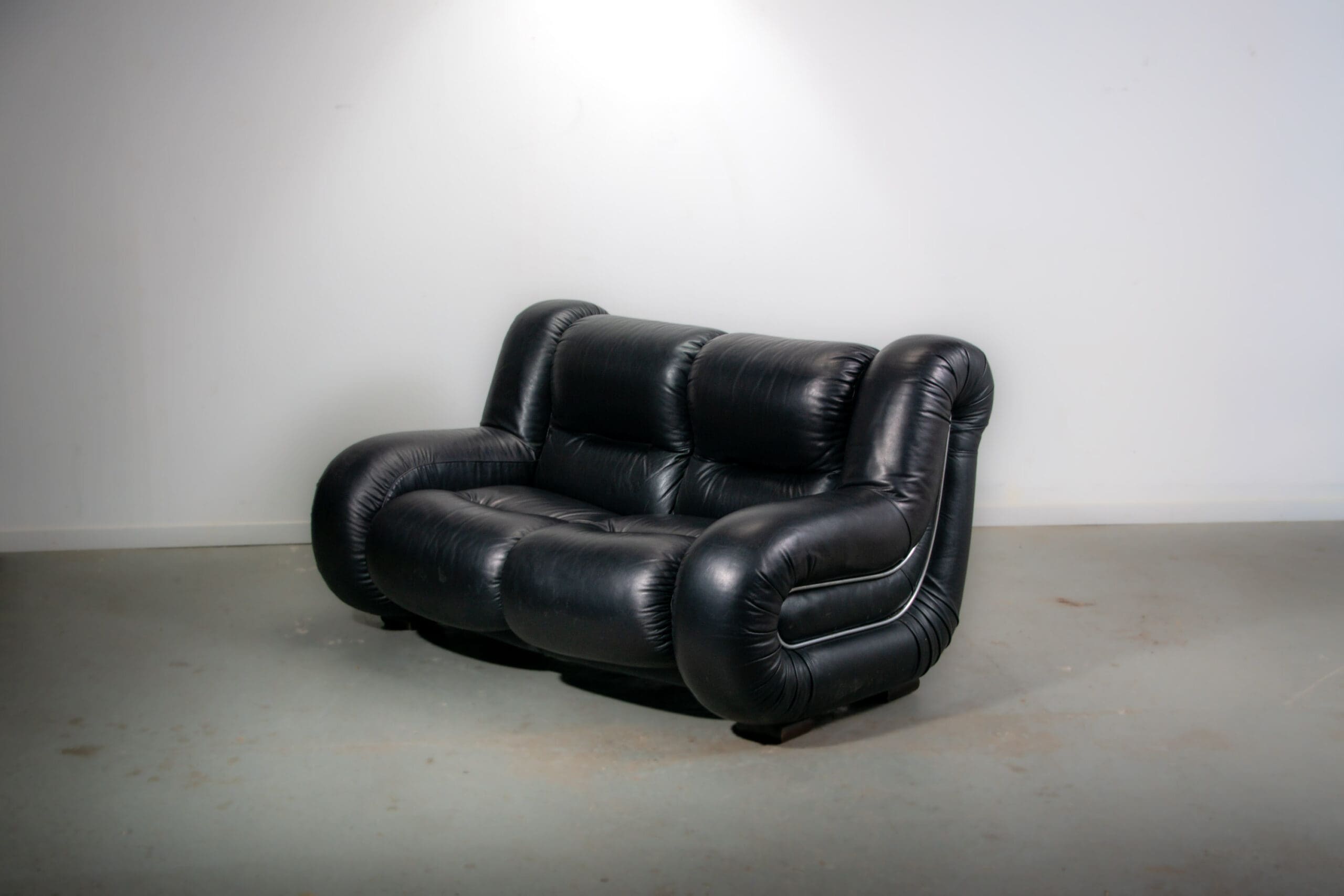 Black leather space age Italian 2 seater sofa