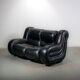 Black leather space age Italian 2 seater sofa