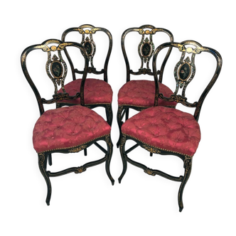 Série de quatre chaises Napoléon III, bois noirci burgauté et assises capitonnées de soie brochée