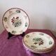 Set of 5 flat plates, signed Longwy.