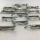 12 knife holders by Edouard Sandoz for the Goldsmith Gallia-Christofle