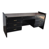 Hungarian Art Deco desk in black painted wood with a brown top and metal handles.