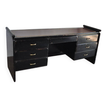 Hungarian Art Deco desk in black painted wood with a brown top and metal handles.