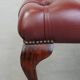 In very good condition elegant red/brown chesterfield ottoman made of cow leather