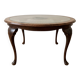 Louis XV coffee table in wood with decorative glass top.