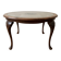 Louis XV coffee table in wood with decorative glass top.