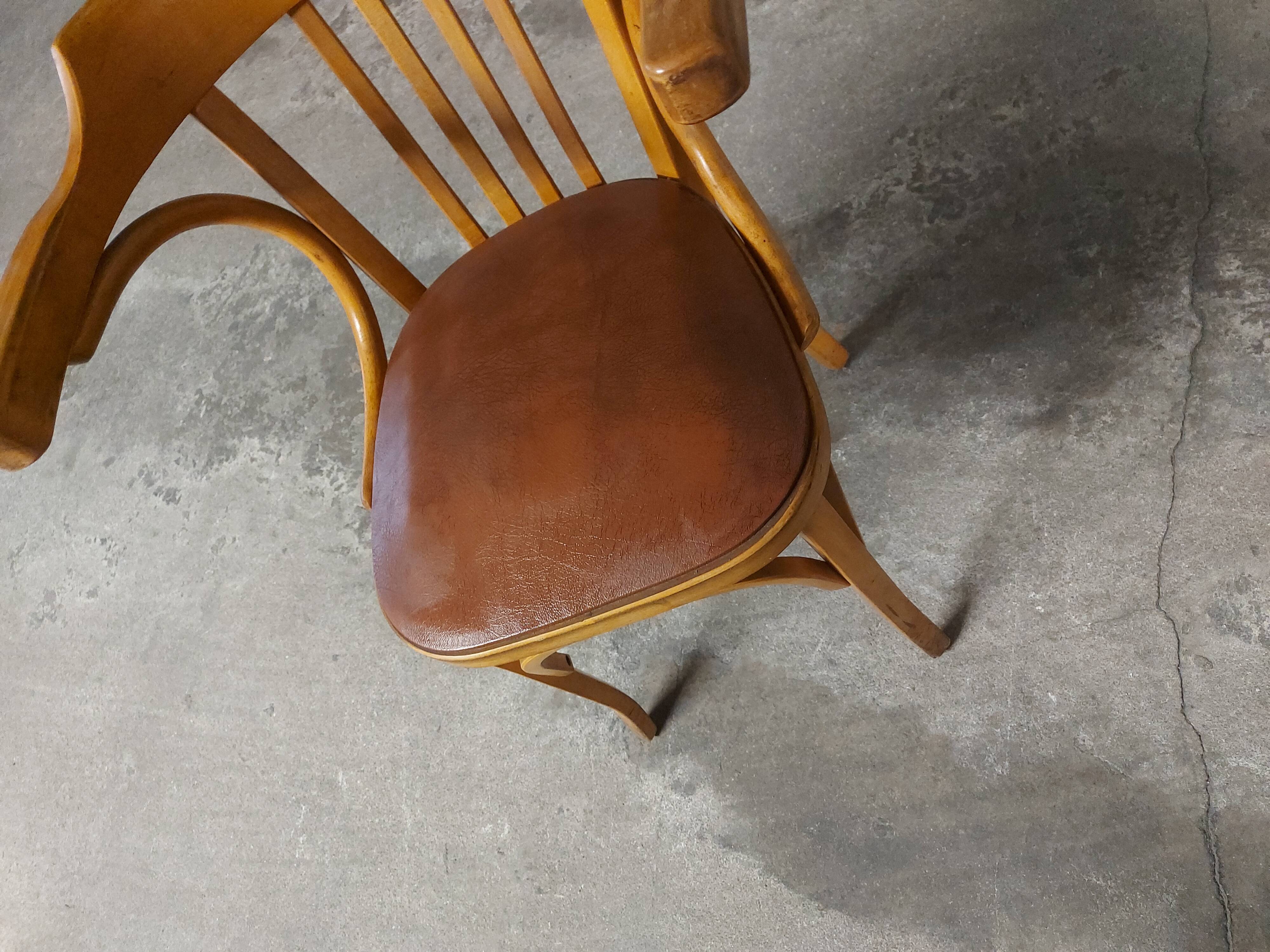 Fauteuil vintage en bois Baumann