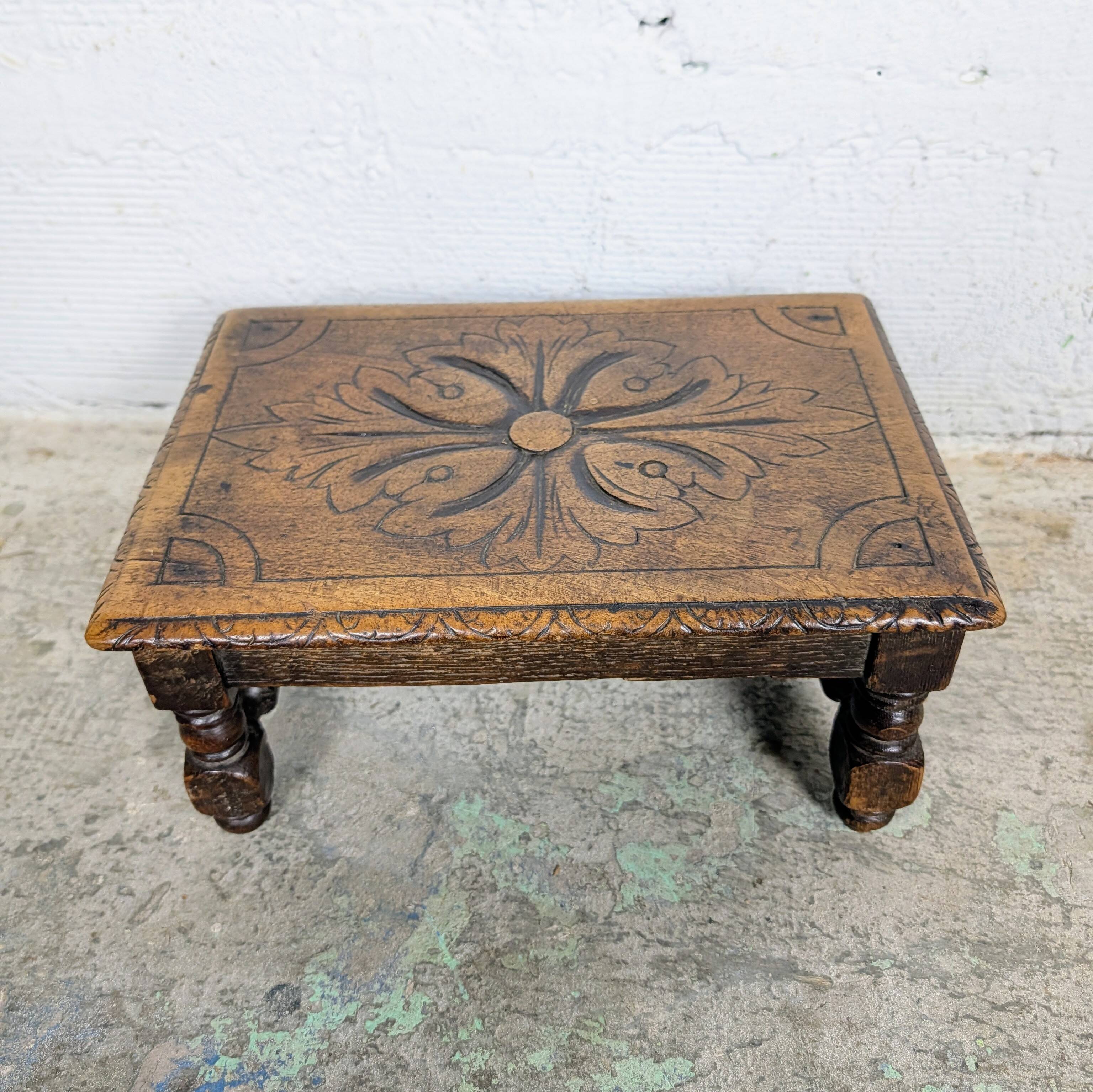 Carved wooden footrest