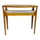 Small contemporary console in stained walnut wood.